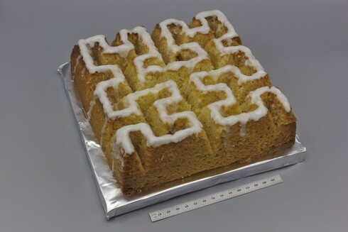 A regular cake but the shape of a space filling Hilbert curve.