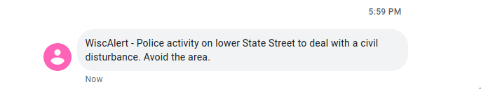 text message saying "WiscAlert - Police activity on lower State Street to deal with a civil disturbance. Avoid the area."