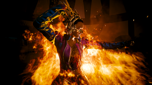 Againy first V. in flames this times she poses to the right of the picture .
Her pose ist that of Sailor Jupiter. Her left arm raises through and partly over the flames, her left arm is risen above her head as she seems to prepare a strike. 
The flames could almost be mistaken for long hair falling from her head behind the arm down her back, waving in the wind.

V.'s head looks to the right down her left arm with an eerie smile on her face, she wears a headpiece that looks like a tech crown headset glasses mix that doesn't covers her face, symbolized flames are visible on her top, the flames reflect on the material of her pants and a quirky little flame erupts from her belt line.