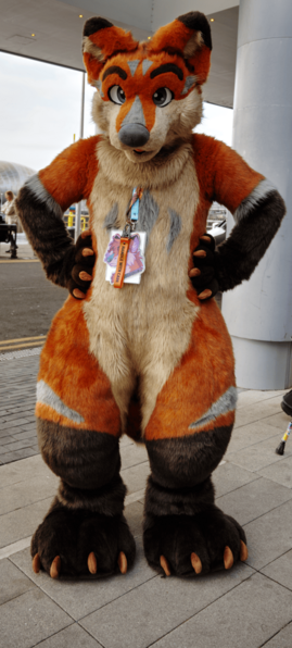 Terrence is standing, hands on hips, staring at you
