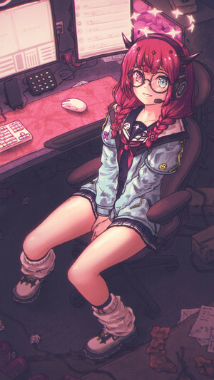 IRyS sitting on a chair next to the desk with her streaming setup in a messy room