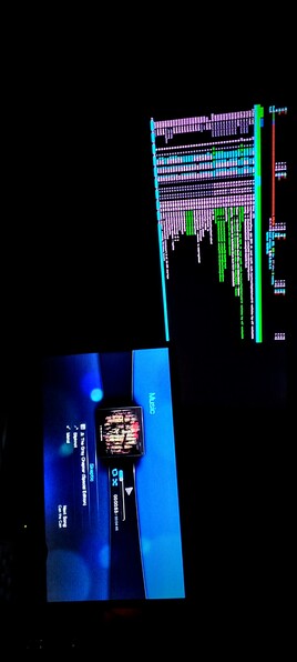 The photograph composed in total darkness shows two IPS LED panels side by side. The top screen displays a colorful daemon chart, the output of htop! with various coloured bars and lines, indicating daemon movements over time. The chart includes green and red bars, which typically represent process variations over time. The bottom IPS LED panel shows a music 🎵 player interface with a blue background, with the song "Skeptic - The Gray Chamber (Special Edition)" by "Slipknot" playing. The music player shows the current time as 00:00:53 out of a total duration of 00:01:48. The word "Music" is visible on the screen, indicating the current mode. The overall image suggests a person monitoring processes with htop while listening to music on their multi engine player.

 Ovis2-8B

🌱 Energy used: 0.206 Wh