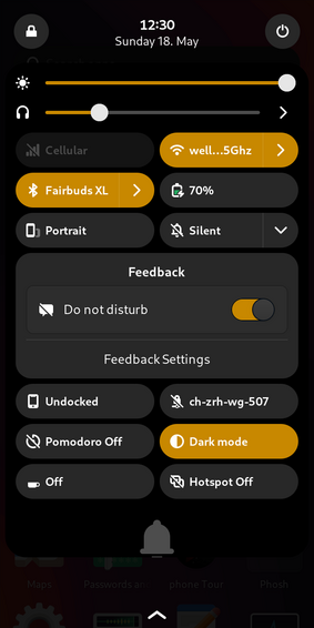 A screenshot showing phosh with the settings panel unfolded and the Feedback quick settings status page open. It features a "Do not disturb" switch that can be toggled on and off and a "Feedback Settings" button.