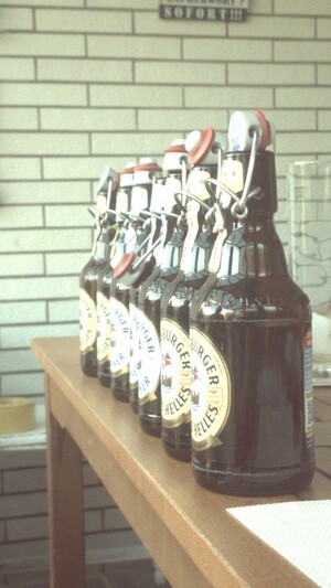 Photo of a row of beer swing top bottles